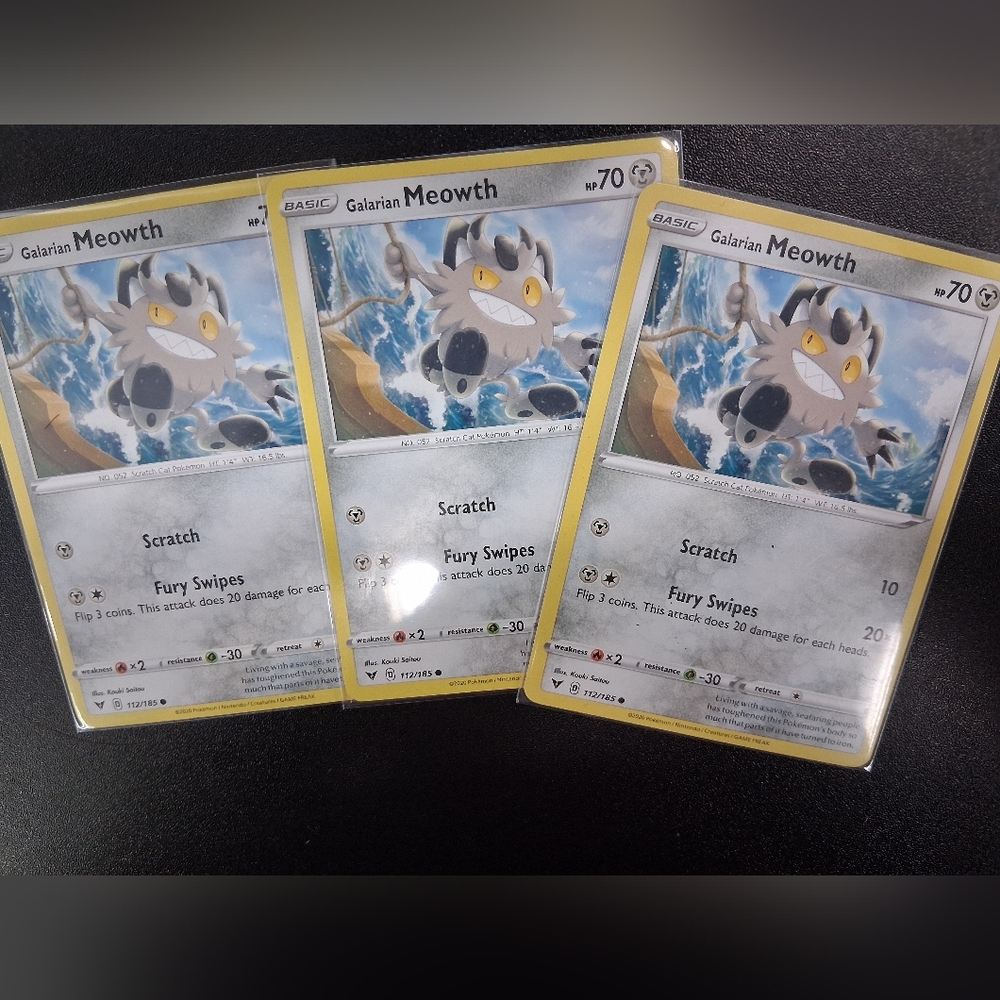 Pokemon Trading Cards - Galarian Meowth with Yellow and Blue Accents